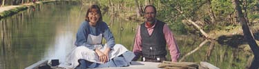 Photo of interpetive rangers on top of canal boat.